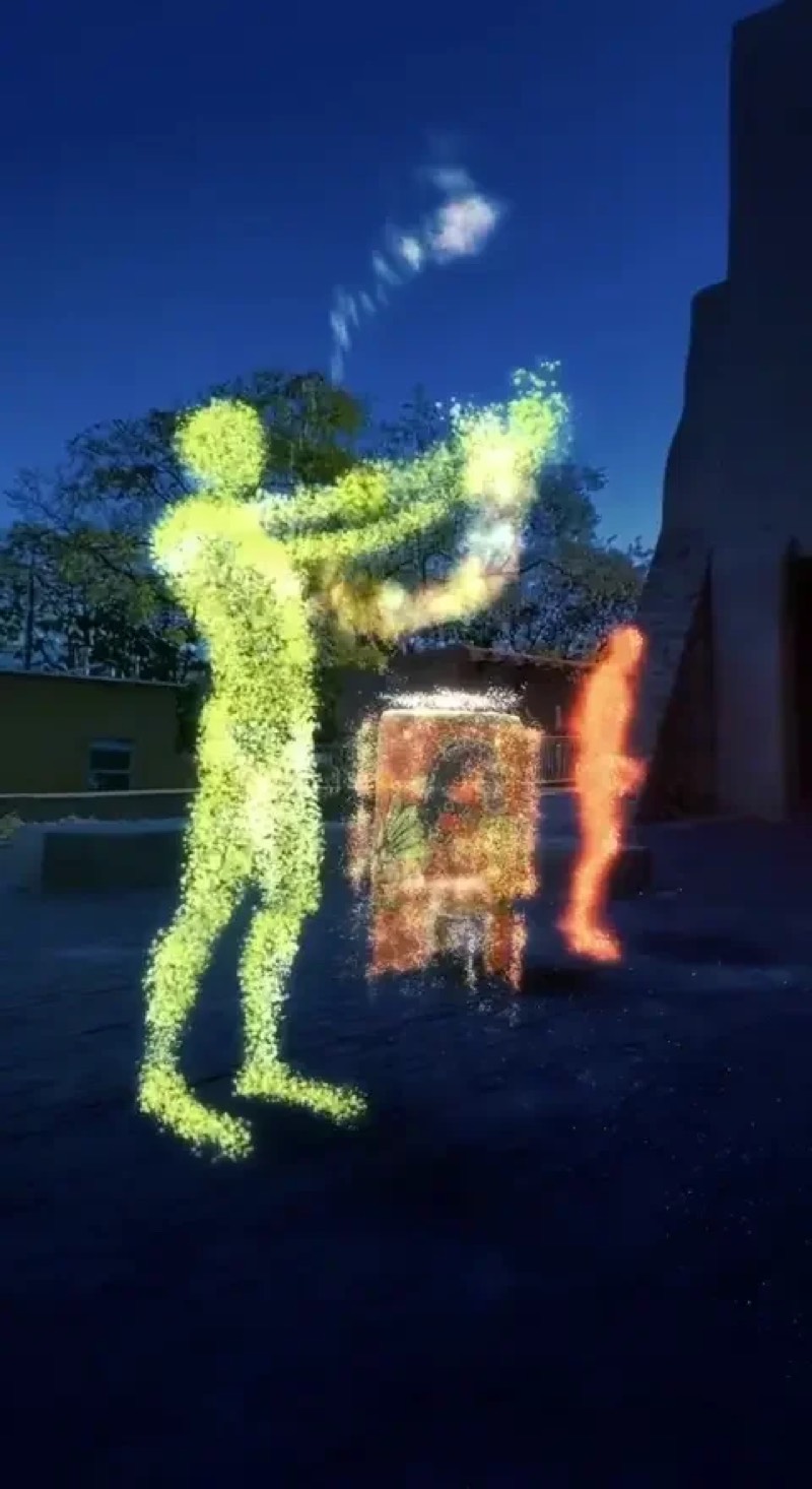 A glowing green AR figure at night in Santa Fe